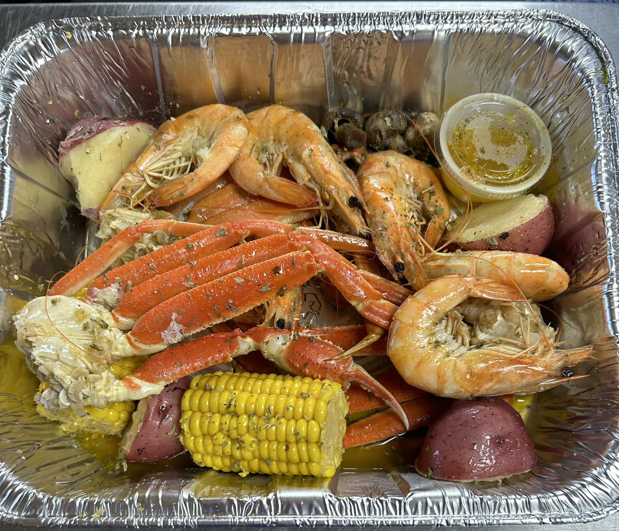 A seafood boil with crab legs, shrimp, corn and red potatoes from Big's Place